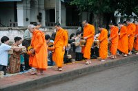 Monks collecting arms, Luang Prabang